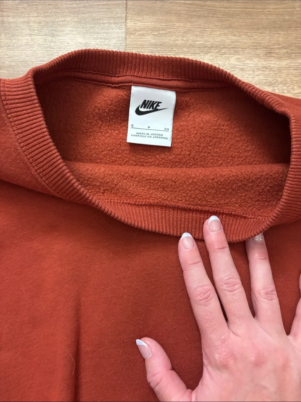 Nike Women's Burnt Orange Crewneck Sweatshirt with Black Swoosh